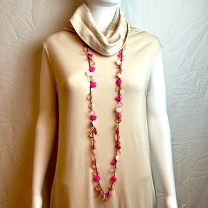 Vintage long pink “petal” necklace that can be doubled up.